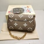 Louis Vuitton Favorite Bicolor Monogram Empreinte Leather Beige 24Cm M45836 - Image 3